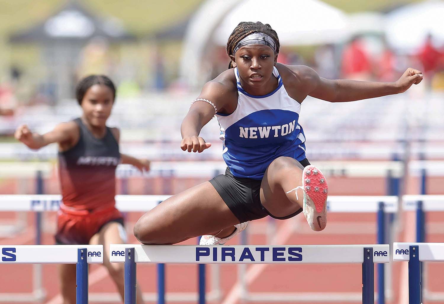 Newton High School's Erin Ware runs the 100 meter hurdles  in at  the MHSAA State Track & Field Championships for Class 2A, on Friday, April 29, 2022, at Pearl High School in Pearl, Miss.