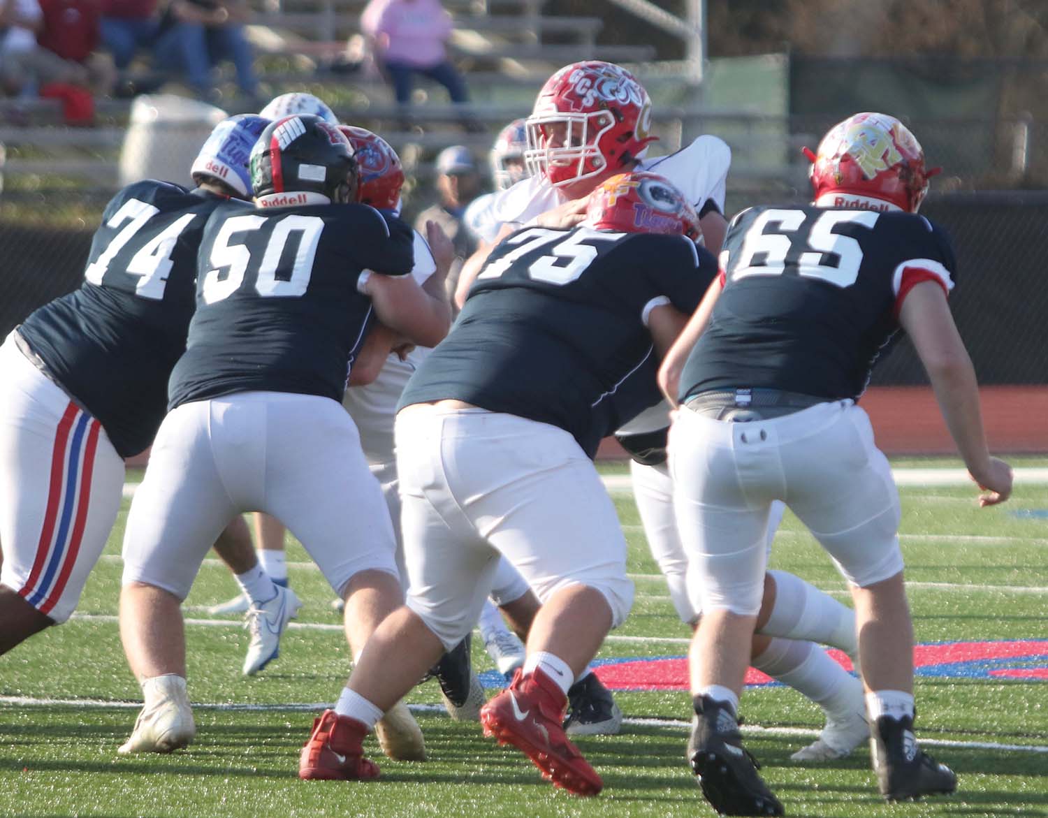 NCAs Trey Mathis and Braxton Therrell block in the MAIS all-star football game on Friday at Jackson Prep.