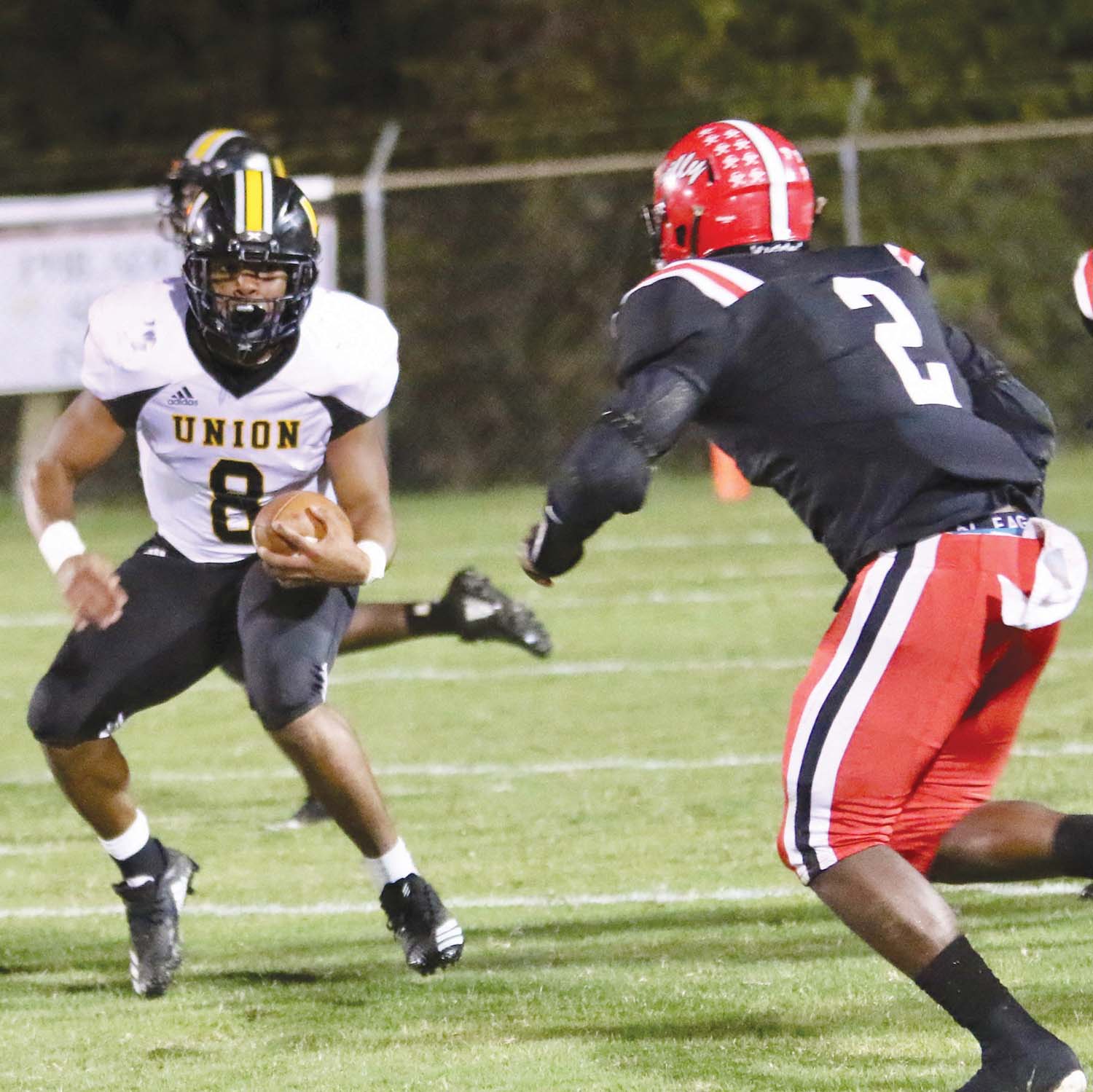 Kenyon Clay (8) breaks around the Philadelphia defense to make a Union first down. Jason Dyess/Fourth & Goal Photography