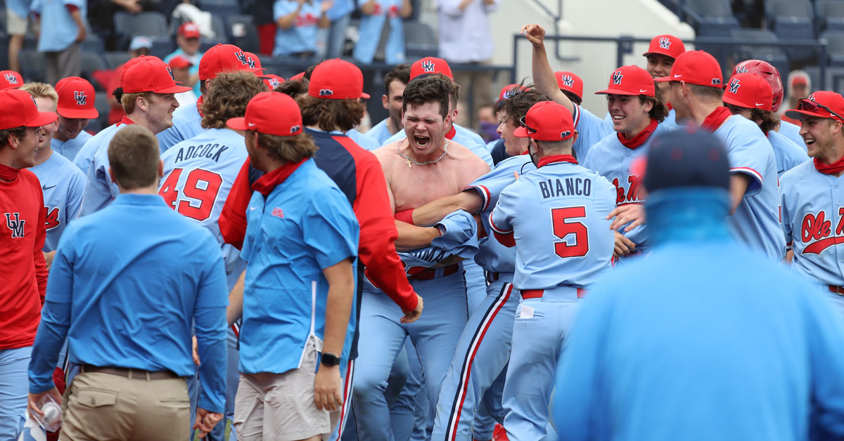 Ole Miss players rip the jersey off Kemp Alderman during the celebration of his game-winning walk-off home run Saturday afternoon. | Photo courtesy of Ole Miss Athletics