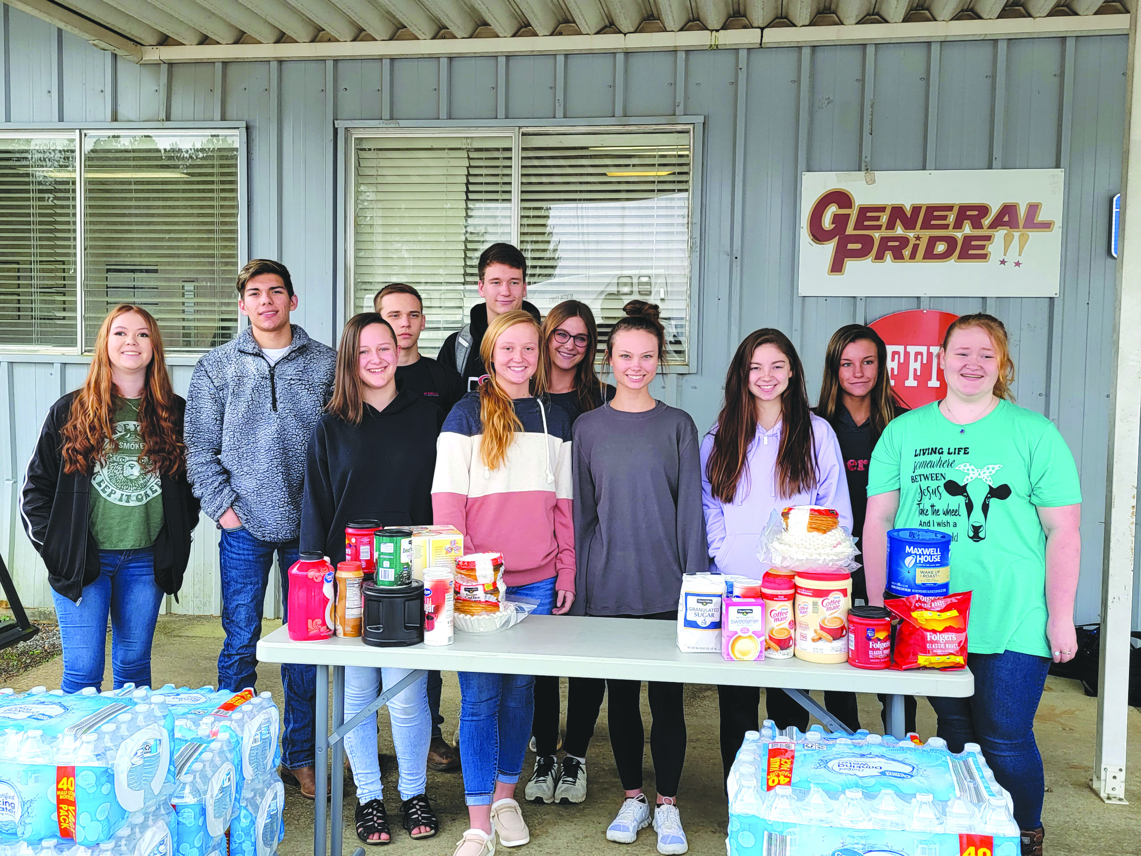 Donations  by NCA Student Council and Honor Society collected by the students and families of NCA. Donated to Newton County CareMed Ambulance Service. Pictured are Left to right: Carlee Bess Williams, Wesley Chapman, Ashley Smith, Braxton Kelly, Lee Hollingsworth (Back row), Asten Russell, Brooklyn Ellis, Ashley Barrett, Gracie Humphreys,  Belle Hollingsworth,  Taylor Garrison.  