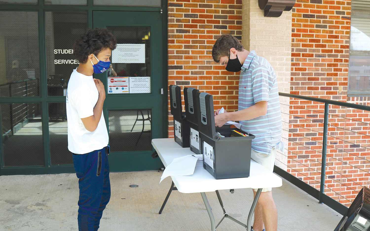 Newton’s Diavion Croft (left) checks in as he prepares to complete one of ECCC’s special Orientation sessions.