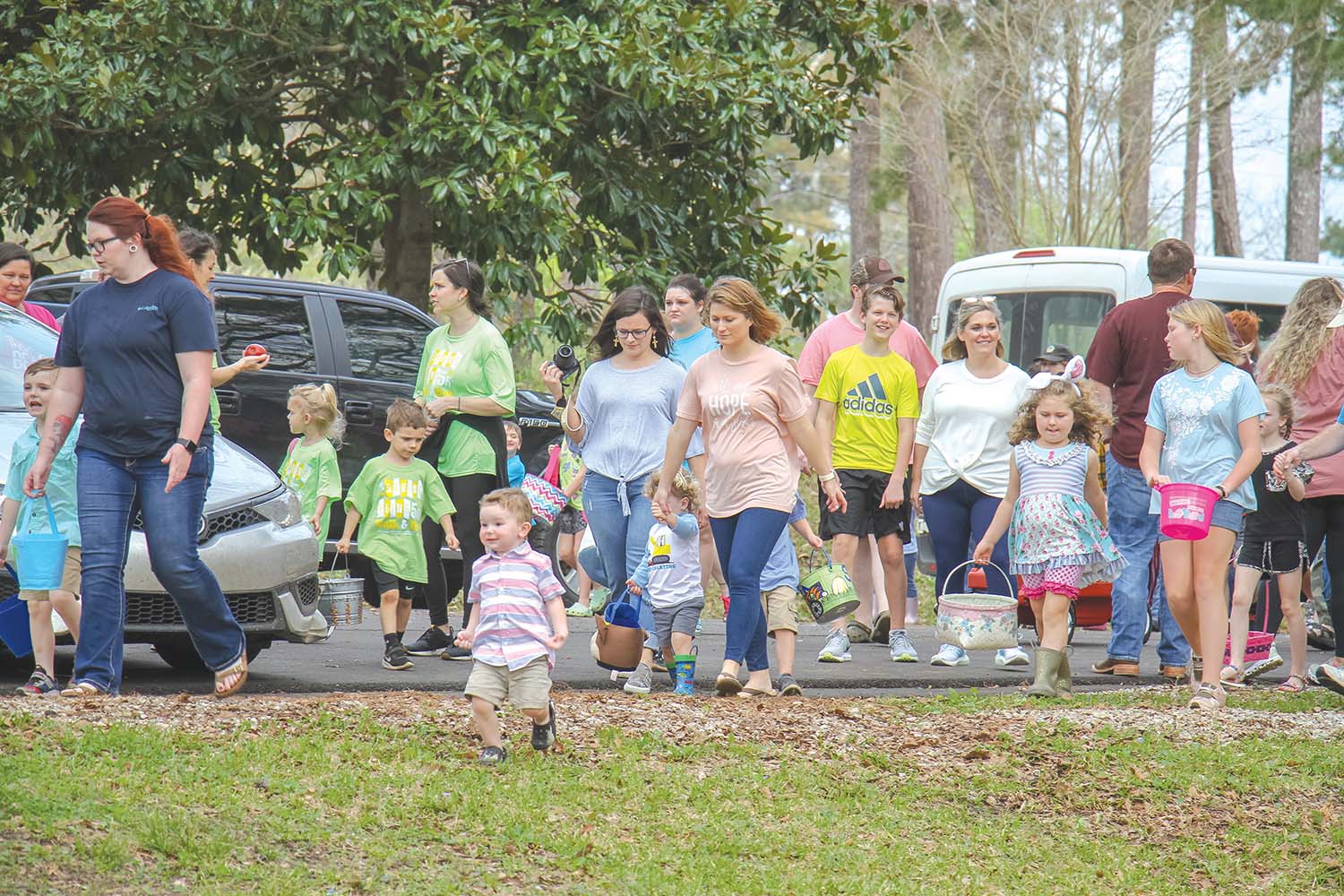 A crowd of children an their parents race out to the fields to collect Easter Eggs. Brent Maze/The Appeal
