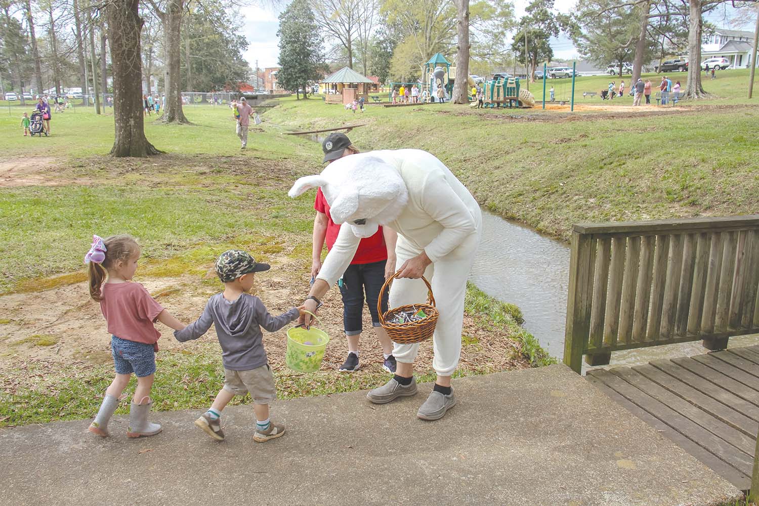 The Easter Bunny gives out candy to attendees of the Union community Easter Egg Hunt at Union City Park Saturday morning. The kids were able to hear the Easter story prior to the hunt. This was one of many events during the Union Spring Fling on Saturday, which began with a 5k run and included a crawfish boil later on. 