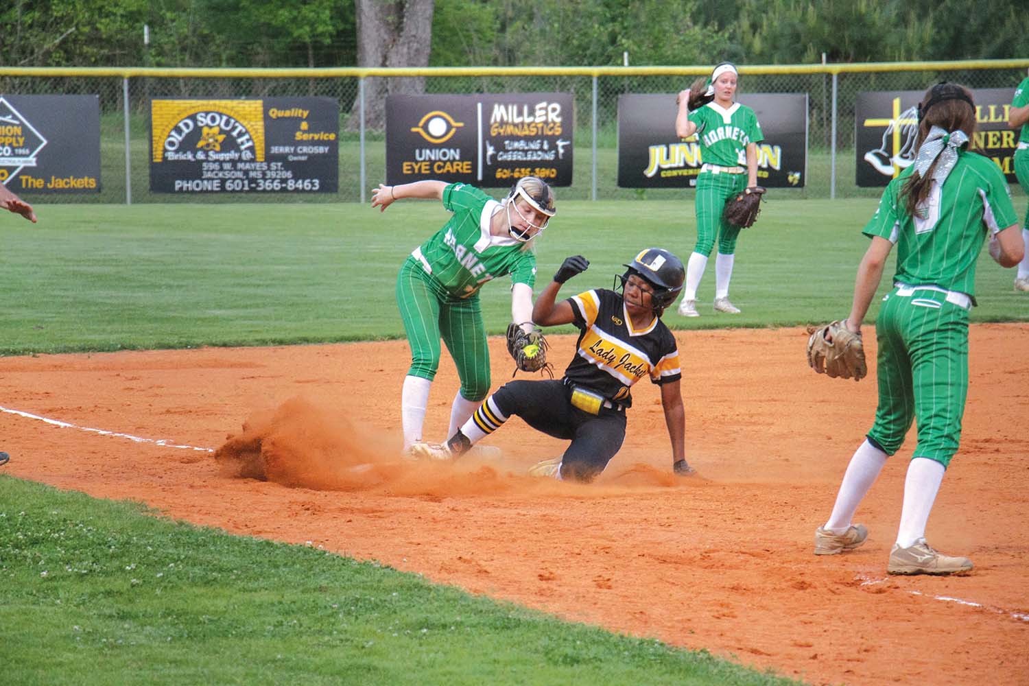DD Hunter slides safely into first base for Union. Brent Maze/The Appeal