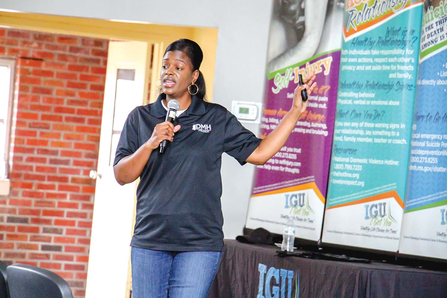 Ja’Qulia Newson, Director of Suicide Prevention for the Mississippi Department of Mental Health’s Division of Outreach and Training, talks to students during the I Got U program.