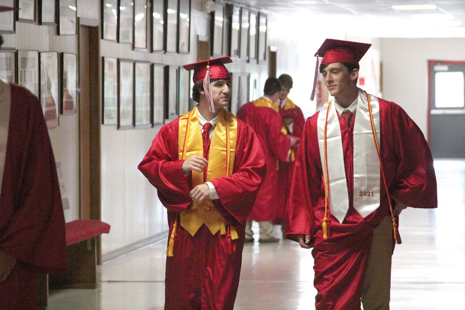 Conner Clark and Riley Boswell walk the NCA halls one last time.