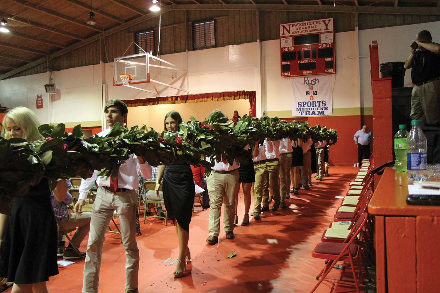 NCA Juniors present rose chain