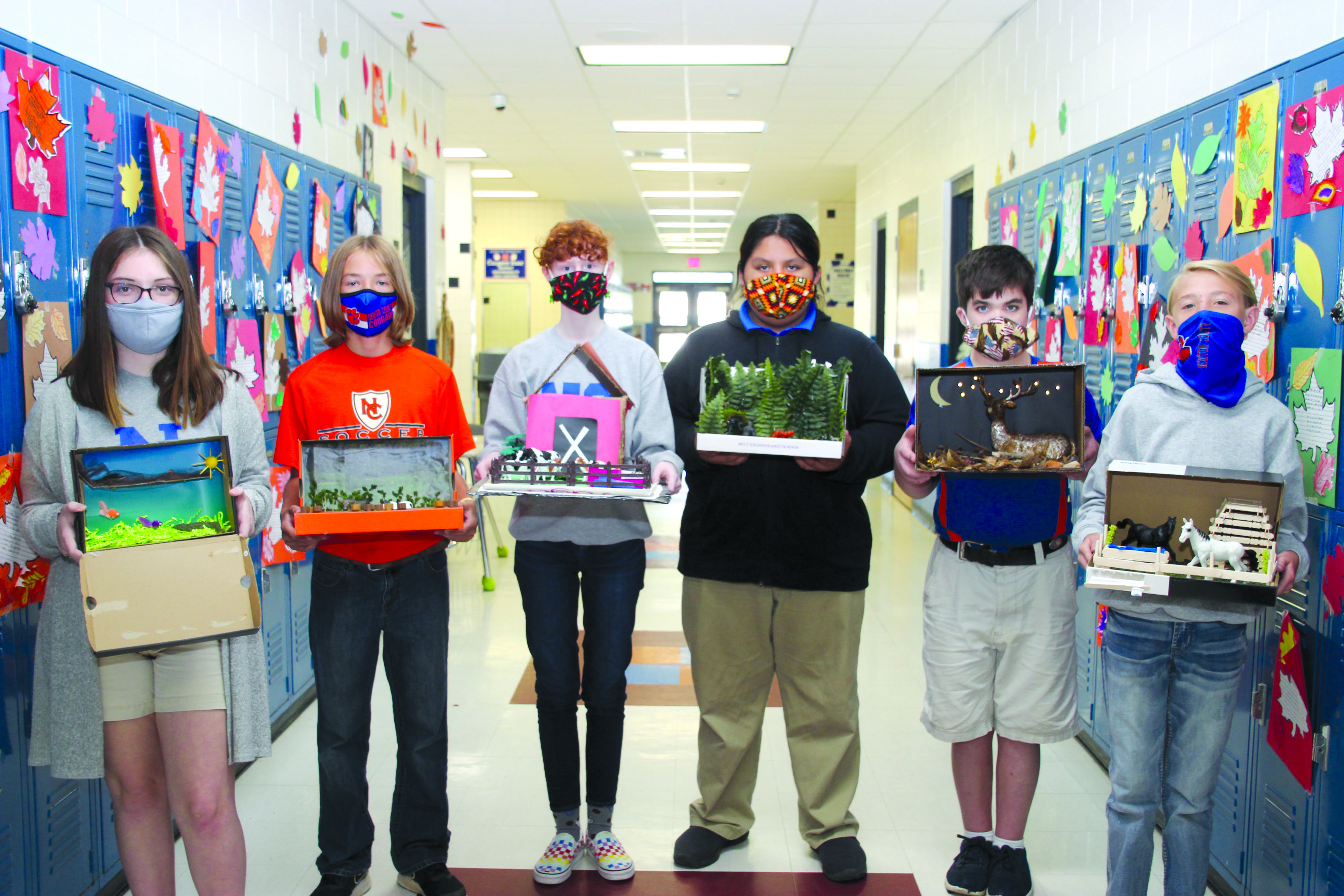 These students were among Heather Harrison’s seventh grade science classes at Newton County Middle School who created and presented a wide range of habitat projects reflective of the supporting plants and animals during this nine weeks, from left, Jocie Johnson, Lyle Hollingsworth, Lorelai McKinion, Zarian John, Blake Chaney and Brody Parkes. 
