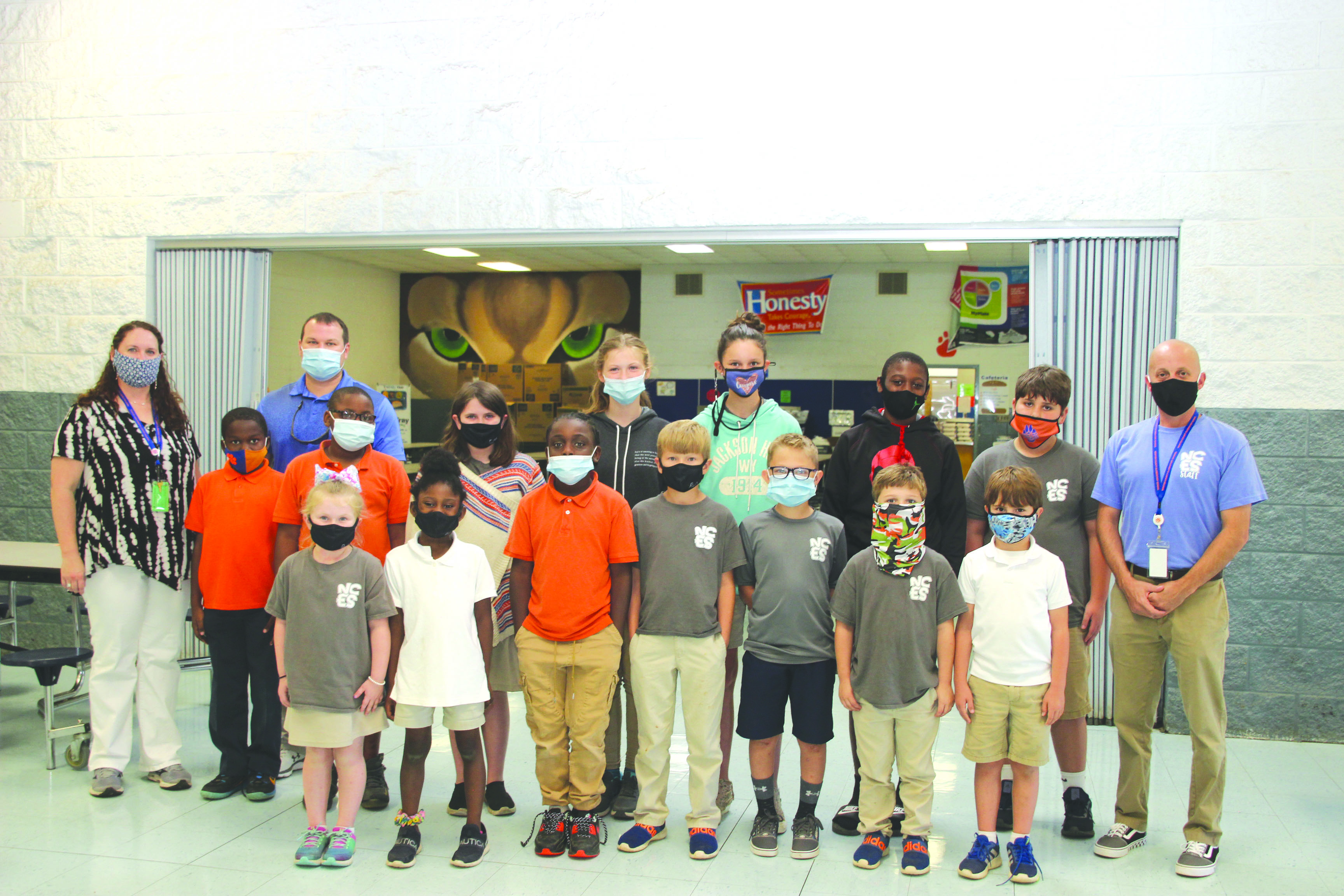 These students were the first to receive Positive Office Referrals at Newton County Elementary School this school year. Each student was invited to a POR Pizza Party to celebrate with the principals from left, Ansley May, Ejuene Murrell, Jeremiah Wilson, Kaleb Crocker, Triston Pierce, Toby Boykin, and Eli Huddleston; back row from left:  NCES Assistant Principal Jessica Loper, Joshua Moore, NCES Assistant Principal John May, Christian Lampkin, Hannah Foley, Ava Youngblood, Karmyn Butler, Quan Nickson, Cole Bagley, and NCES Principal Jason Roberson. Recommendations for a Positive Office Referral are made by faculty and staff who catch a Little Cougar going above and beyond while on campus. 