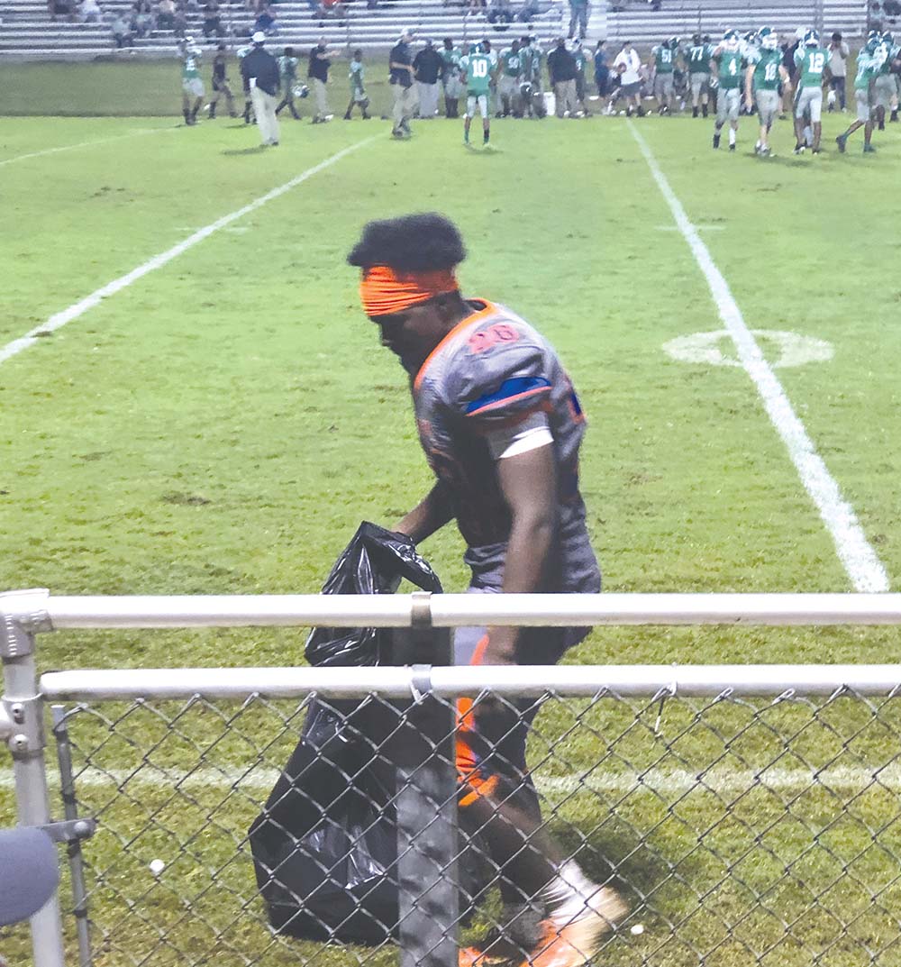 While Newton County High School Senior running back Devyon May engages in Art Appreciation class to complete his high school graduation requirements, his all-in character both on and off the field, in class and outside of class, has been noticed by educators and spectators. Recently, Devyon was also photographed picking up empty water bottles on the sidelines. The pandemic has been challenging even for sideline water breaks, but with students like Devyon making the adjustments and taking the opportunity to “go the distance” the future remains in good hands. Newton County Schools salutes the Class of 2021.   