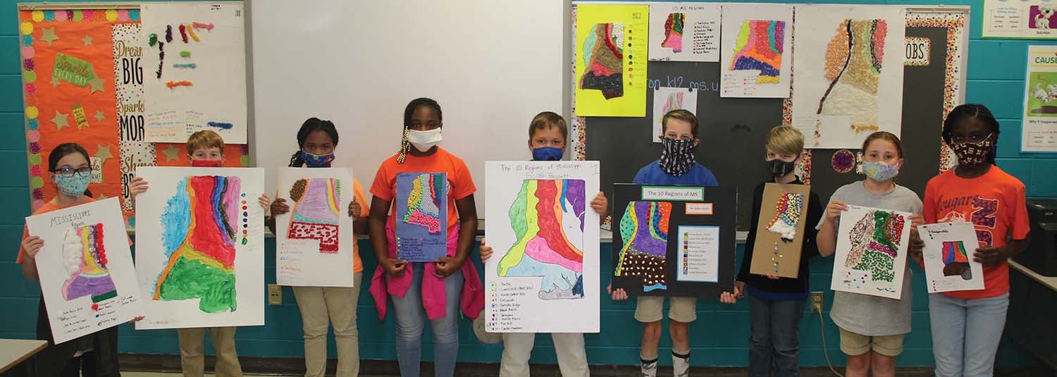 Fourth grade students in Sherri Walker’s Social Studies classes created a Mississippi Regions project from left:  Kara Pierce, Cooper Franklin, Raylin Wright, London Towner, Scott Bassett, Kelby Wolfe, Mark Savell, Erin Tullos and Haidyn Newell.  Submitted photo