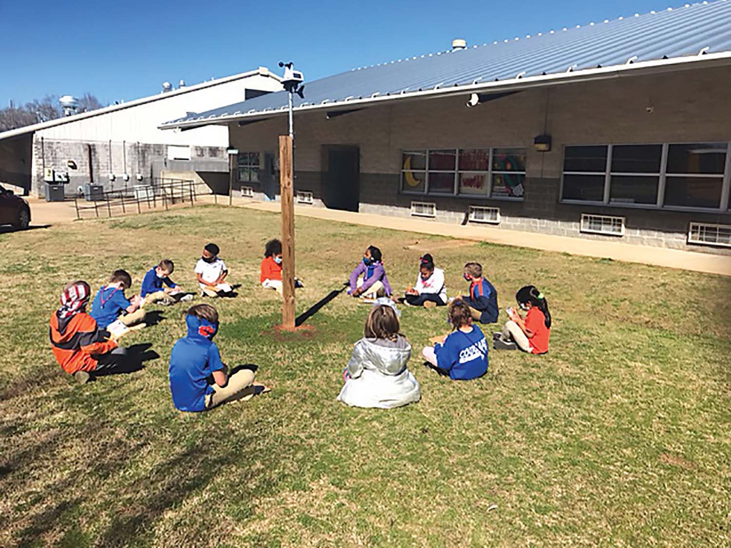 First graders at Newton County Elementary School are studying Earth Science by observing a weather station located on the NCES campus. This station collects and transmits data to the classroom setting.  Submitted photo