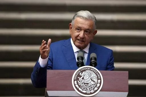 Mexican President Andres Manuel Lopez Obrador speaks during the North America Summit, at the National Palace in Mexico City, Jan. 10, 2023. Obrador said on Feb. 23, 2023 that he'll sign a new bill into law that will cut funding to the country’s electoral agency. (AP Photo/Fernando Llano, File)