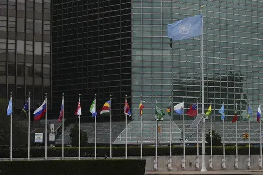Flags fly outside the United Nations headquarters during the 79th session of the UN General Assembly, Wednesday, Sept. 25, 2024. (AP Photo/Julia Demaree Nikhinson)