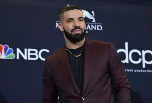 Drake poses at the Billboard Music Awards in Las Vegas on May 1, 2019. Police are investigating a shooting outside rapper Drake’s mansion that left a security guard seriously wounded. Authorities did not confirm whether Drake was at home at the time of the shooting, but said his team is cooperating. The shooting happened around 2 a.m. Tuesday in the affluent Bridle Path neighborhood of Toronto. (Photo by Richard Shotwell/Invision/AP, File)