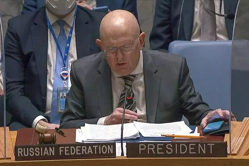 In this image from UNTV video, Vasily Nebenzya, Permanent Representative of Russia to the United Nations, speaks during an emergency meeting of the U.N. Security Council Wednesday, Feb. 23, 2022, at U.N. headquarters. (UNTV via AP)
