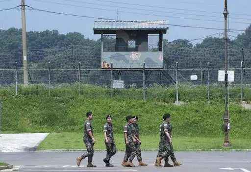 South Korean army soldiers pass by a military guard post at the Imjingak Pavilion in Paju, South Korea, near the border with North Korea, Wednesday, July 19, 2023. South Korea and the United States began large annual military exercises Monday, March 4, 2024, to bolster their readiness against North Korean nuclear threats after the North raised animosities with an extension of missile tests and belligerent rhetoric earlier this year.(AP Photo/Ahn Young-joon, File)