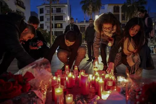 People light candles on Jan. 26, 2023, next to a memorial site for a church sacristan who was killed on Jan. 25 in Algeciras, southern Spain. Far-right groups have used Twitter to spread hate directed at Muslims and Immigrants. Many of them reference the Reconquista, the period in the Middle Ages that saw Christians retake vast parts of the Iberian peninsula from its Muslim leaders. The term has also been used by the Vox Party, a far-right party that has been praised by ex-U.S. President Donald 