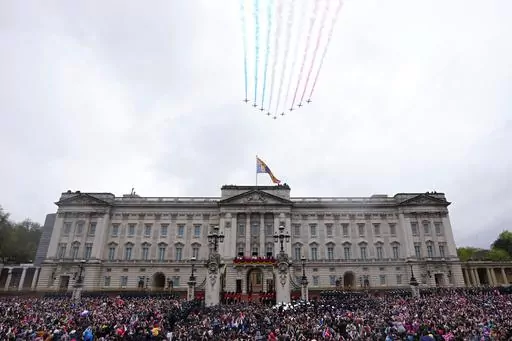 Britain's King Charles III and Queen Camilla on the balcony of Buckingham Palace watch the Royal Air Force Red Arrows fly over after their coronation ceremony, in London, on May 6, 2023. A change in monarchs, double-digit inflation and ongoing costs of renovating Buckingham Palace contributed to a 5% increase in publicly-funded spending by Britain's royals, royal accounts published Thursday, June 29, 2023 showed. (AP Photo/Petr David Josek, File)