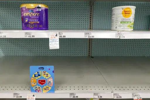 Baby formula is displayed on the shelves of a grocery store in Carmel, Ind. on May 10, 2022. A bill introduced early June, 2022, would require the Food and Drug Administration to inspect infant formula facilities every six months. U.S. regulators have historically inspected baby formula plants at least once a year, but they did not inspect any of the three biggest manufacturers in 2020. (AP Photo/Michael Conroy, File)