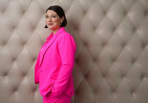 Taylor Jenkins Reid, author of the novel "Daisy Jones and the Six," poses for a portrait at the Four Seasons Hotel, Wednesday, Feb. 22, 2023, in Los Angeles. (AP Photo/Chris Pizzello)