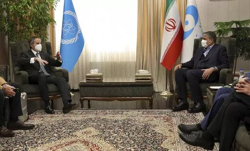 International Atomic Energy Organization, IAEA, Director General Rafael Mariano Grossi, left, speaks with Head of Atomic Energy Organization of Iran Mohammad Eslami during their meeting in Tehran, on March 5, 2022. As the war in Ukraine rages on, diplomats trying to salvage the languishing 2015 Iran nuclear deal have been forging ahead with negotiations despite distractions caused by the conflict. (AP Photo/Vahid Salemi, File)