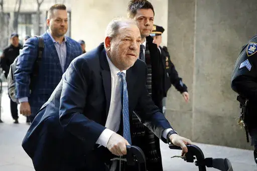 Harvey Weinstein arrives at a Manhattan courthouse as jury deliberations continue in his rape trial in New York, on Feb. 24, 2020. A New York appellate court on Thursday, June 2, 2022, has upheld Weinstein's rape conviction, rejecting the disgraced movie mogul's claims that the judge at the landmark #MeToo trial prejudiced him by allowing women to testify about allegations that weren't part of the criminal case. (AP Photo/John Minchillo, File)