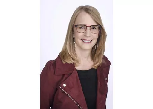 This undated file photo provided by NerdWallet shows Liz Weston, a columnist for personal finance website NerdWallet.com. Despite our plans, sometimes you have to move quickly and can’t take everything, or you’re helping to clear out a family member’s home on a short timeline. Focus first on four things that need special handling: paperwork, photos, prescriptions and perishables. With those out of the way, turn to things you, your family member or an heir definitely want to keep. Set a tim