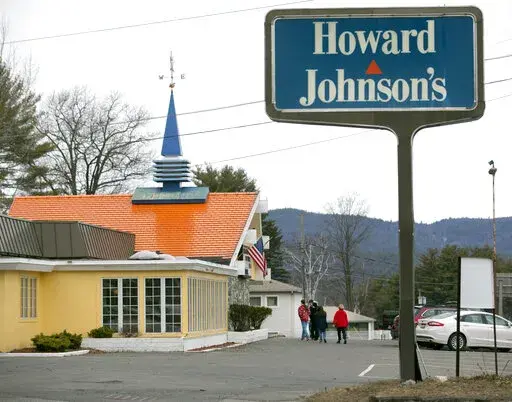 Customers walk into Howard Johnson's Restaurant in Lake George, N.Y., on April 8, 2015. The Howard Johnson's restaurant in this upstate New York resort village — the last of the once-pervasive eateries serving food under orange roofs with blue spires — is closed. (AP Photo/Mike Groll, File)