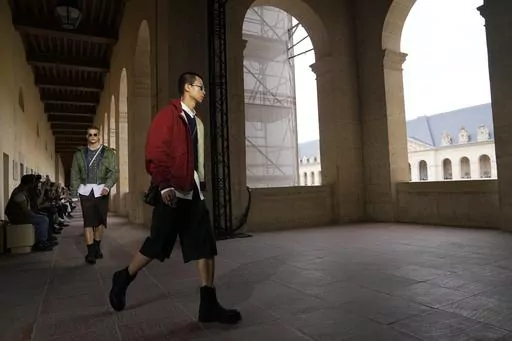 Models wear creations for Givenchy Menswear Spring/Summer 2024 fashion collection presented in Paris, Thursday, June 22, 2023. (AP Photo/Michel Euler)