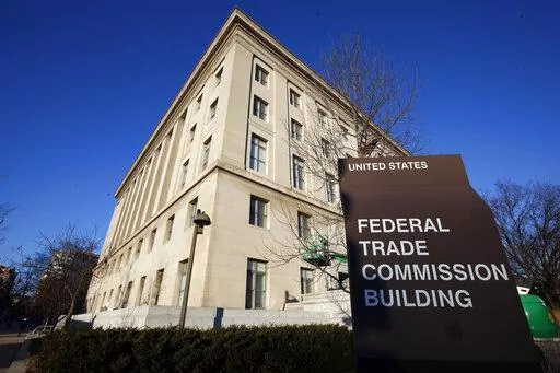The Federal Trade Commission building in Washington pictured on Jan. 28, 2015. The maker of the popular Fortnite video game will pay $520 million in penalties and refunds to settle complaints revolving around children's privacy and its payment methods that tricked players into making unintended purchases, U.S. federal regulators said Monday, Dec. 19, 2022. (AP Photo/Alex Brandon, File)