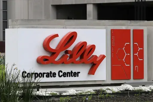 A sign for Eli Lilly & Co. sits outside their corporate headquarters in Indianapolis on April 26, 2017. A closely watched Alzheimer's drug from Eli Lilly won the backing of federal health advisers on Monday, June 10, 2024, setting the stage for the treatment's expected approval for people with mild dementia caused by the brain-robbing disease. (AP Photo/Darron Cummings, File)