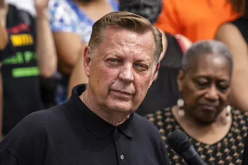 Father Michael Pfleger speaks during a news conference outside St. Sabina Church in Chicago, May 24, 2021. Pfleger has been reinstated as leader of his parish after being cleared by church officials of allegations that he sexually abused a minor decades ago. The Chicago Archdiocese released a letter Saturday, Dec. 10, 2022 saying that a review board found “no reason to suspect” that the Rev. Michael Pfleger was guilty of the allegations. (Ashlee Rezin Garcia/Chicago Sun-Times via AP, file)