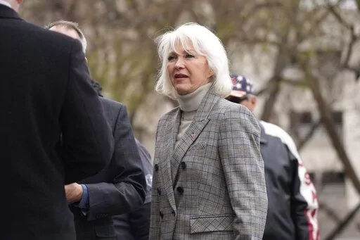 Mesa County, Colo., clerk Tina Peters, talks to well-wishers at a rally staged to voice concerns about free and fair elections on the west steps of the State Capitol Tuesday, April 5, 2022, in downtown Denver.  Add one more contest to the white-hot races for Congress and governor that will dominate this year's midterm elections: secretaries of state. Former President Donald Trump's attempts to reverse the results of the 2020 election and his subsequent endorsements of candidates for state electi