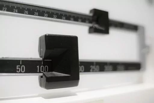A beam scale is seen in New York on Tuesday, April 3, 2018. A study of young kids in the Women, Infants and Children program adds to evidence that severe obesity is becoming more common in young U.S. children. The update was published Monday, Dec. 18, 2023, in the journal Pediatrics. (AP Photo/Patrick Sison, File)