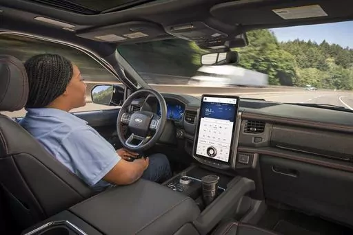 This photo provided by Ford shows the BlueCruise driver system, which gives the driver the option to go hands-free when certain conditions are met. (Courtesy of Ford Motor Co. via AP)