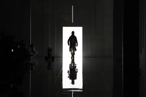 A model wears a creation as part of the men's Dsquared2 Fall-Winter 2024-2025 collection, that was presented in Milan, Italy, Friday, Jan. 12, 2024. (AP Photo/Antonio Calanni).