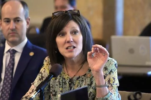 Mississippi House Medicaid Committee Chairwoman Rep. Missy McGee, R-Hattiesburg, right, asks a question of the representatives from the Hilltop Institute, a nonpartisan research organization, unseen, who presented a brief on the economic impact of Medicaid expansion in Mississippi, to the committee, media and lobbyists at the state Capitol in Jackson, Miss., Tuesday, Feb 20, 2024. Committee member State Rep. Clay Mansell, R-Clinton, left, was among the legislators who attended the briefing. (AP 