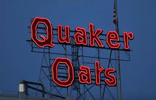 The Quaker Oats sign is seen in Cedar Rapids, Iowa on Tuesday, June 8, 2021. The Quaker Oats Company has expanded a December recall of more than 40 products that may be contaminated with salmonella to include two dozen additional types of granola bars, cereals and snack foods, Friday, Jan. 12, 2023. (Rebecca F. Miller/The Gazette via AP, File)