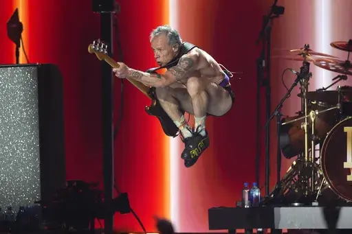 Flea of Red Hot Chili Peppers performs during the FireAid benefit concert on Thursday, Jan. 30, 2025, at The Forum in Inglewood, Calif. (AP Photo/Chris Pizzello)