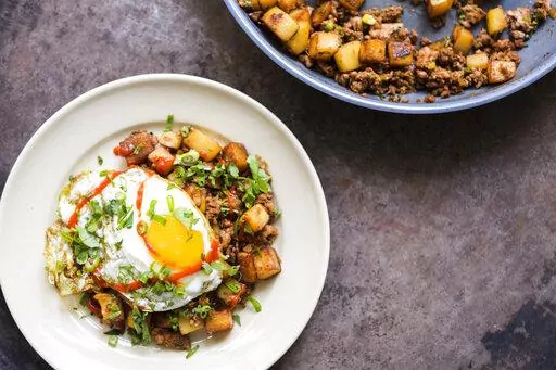This image released by Milk Street shows a recipe for Macanese Meat-and-Potato Hash. (Milk Street via AP)