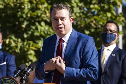 Pedro Martinez speaks shortly after Mayor Lori Lightfoot announced him as the new chief executive of the Chicago Public Schools during a news conference in Chicago on Sept. 15, 2021. Martinez says classes will be canceled Wednesday, Jan. 5, 2022, if the teachers union votes to switch to remote learning due to record COVID-19 levels. (Ashlee Rezin/Chicago Sun-Times via AP, File)