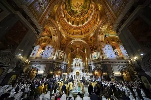 Russian Orthodox Patriarch Kirill, center, delivers the Christmas service in the Christ the Saviour Cathedral in Moscow, Russia, Friday, Jan. 6, 2023. While much of the world has Christmas in the rearview mirror by now, people in some Eastern Orthodox traditions will celebrating the holy day on Sunday. Jan. 7, 2024. (AP Photo/Alexander Zemlianichenko, Pool, File)