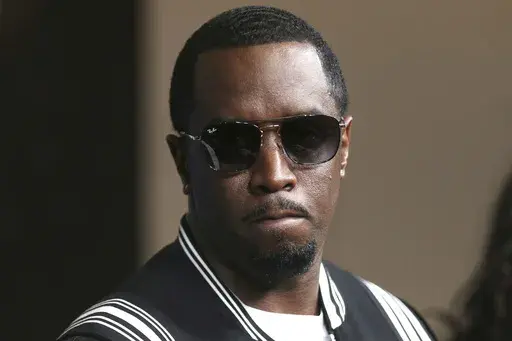 Sean "Diddy" Combs arrives at the LA Premiere of "The Four: Battle For Stardom" at the CBS Radford Studio Center on May 30, 2018, in Los Angeles. Newly released video Friday, May 17, 2024, appears to show Combs beating his former singing protege and girlfriend Cassie in a Los Angeles hotel in 2016. (Photo by Willy Sanjuan/Invision/AP, File)