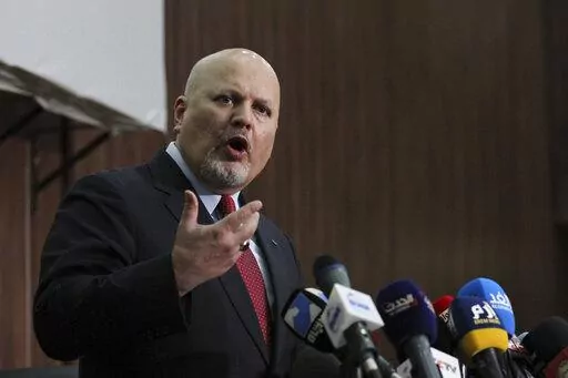 Karim Ahmed Khan, International Criminal Court chief prosecutor, speaks during a news conference at the Ministry of Justice in the Khartoum, Sudan, Aug. 12, 2021. Representatives of a group of nations working together to investigate war crimes committed since Russia's invasion of Ukraine are meeting Tuesday, May 31, 2022 in The Hague amid ongoing calls for those responsible for atrocities to be brought to justice. Tuesday's coordination meeting at the European Union's judicial cooperation agency