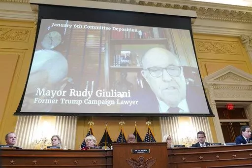 A video deposition of former Trump campaign attorney and former New York Mayor Rudolph Giuliani plays as the House select committee investigating the Jan. 6 attack on the U.S. Capitol continues to reveal its findings of a year-long investigation, at the Capitol in Washington, Monday, June 13, 2022. (AP Photo/Susan Walsh, File)
