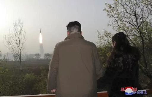 This photo provided April 14, 2023, by the North Korean government, shows North Korean leader Kim Jong Un, center, inspects what it says is the test-launch of Hwasong-18 intercontinental ballistic missile Thursday, April 13, 2023 at an undisclosed location, North Korea. Independent journalists were not given access to cover the event depicted in this image distributed by the North Korean government. The content of this image is as provided and cannot be independently verified. Korean language wa
