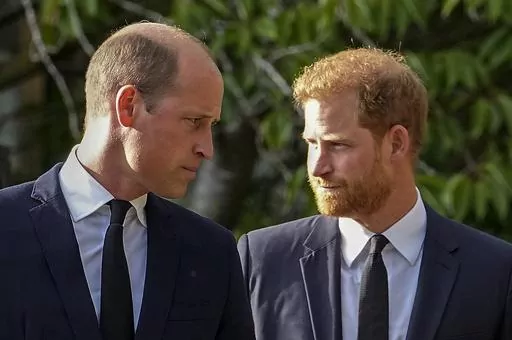 Britain's Prince William and Britain's Prince Harry walk beside each other after viewing the floral tributes for the late Queen Elizabeth II outside Windsor Castle, in Windsor, England on Sept. 10, 2022. Prince Harry flew more than 5,000 miles to see his father after King Charles III was diagnosed with cancer. But he did not see his estranged brother, William, during a visit that lasted scarcely 24 hours. William, meanwhile, returned to public duties for the first time since his wife, Kate, was 
