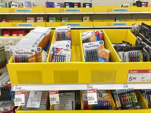 Back to school and office supplies are on sale at a Target store, Wednesday, July 27, 2022, in North Miami, Fla.  Back-to-school shopping is extra expensive this year, due to inflation. But coordinating with people in your community can help you save money.  (AP Photo/Marta Lavandier)